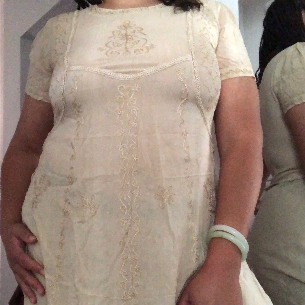 Sheer cottage core, fairy dress with embroidered detail.